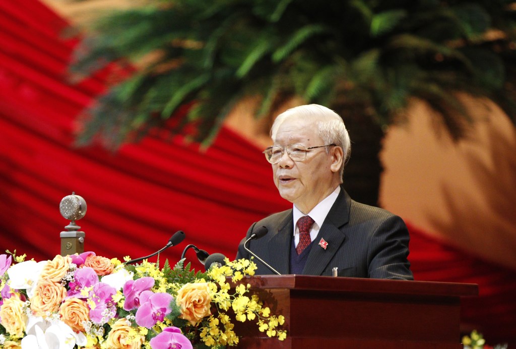 Đồng chí Nguyễn Phú Trọng, Tổng Bí thư, Chủ tịch nước đọc Báo cáo chính trị của Ban Chấp hành Trung ương Đảng khóa XII và các văn kiện trình Đại hội