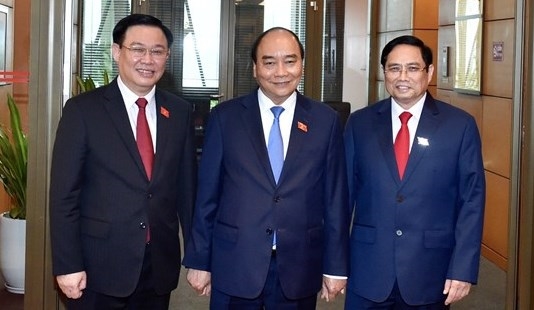Chủ tịch nước Nguyễn Xuân Phúc, Thủ tướng Chính phủ Phạm Minh Chính và Chủ tịch Quốc hội Vương Đình Huệ.